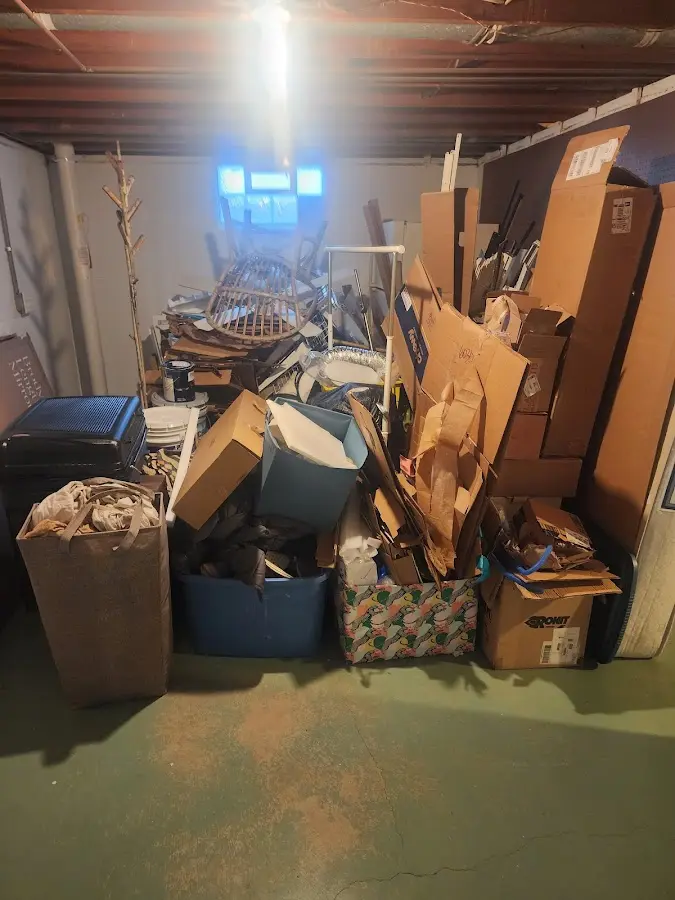 Roll-off dumpster container at job site for Construction Dumpster Rental in Walker